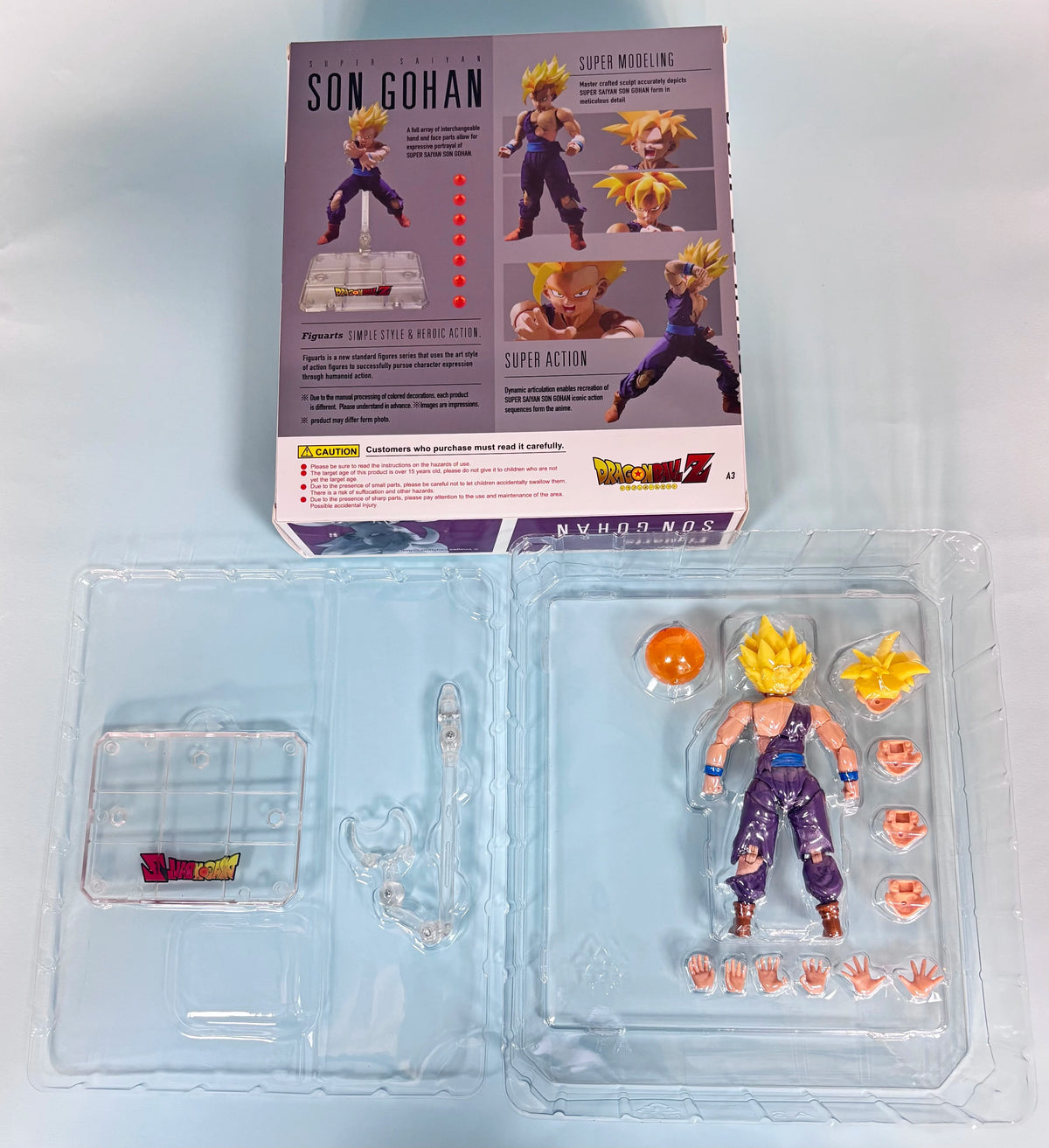 Action figure of Son Gohan from Dragon Ball Z with packaging on a light gray background Bandai S.H.Figuarts Dragon Ball Z: Super Saiyan Gohan Authentic Premium Action Figure