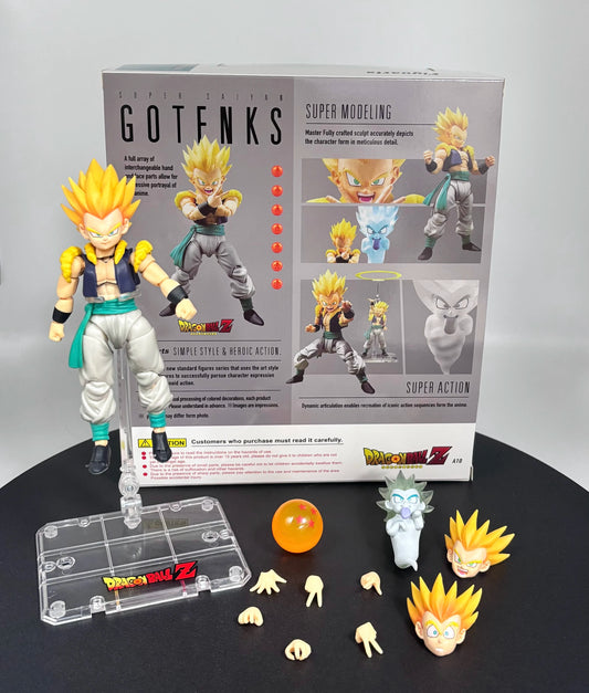 GOTENKS action figure set with packaging and accessories on a black surface Bandai S.H.Figuarts Dragon Ball Z/Super: Super Saiyan Gotenks Authentic Premium Action Figure