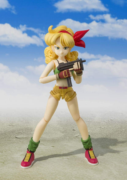 Action figure with blonde hair and red bandana holding a gun against a blue sky background Bandai S.H.Figuarts Original Dragon Ball: Launch Authentic Premium Action Figure – Dual-Personality Edition