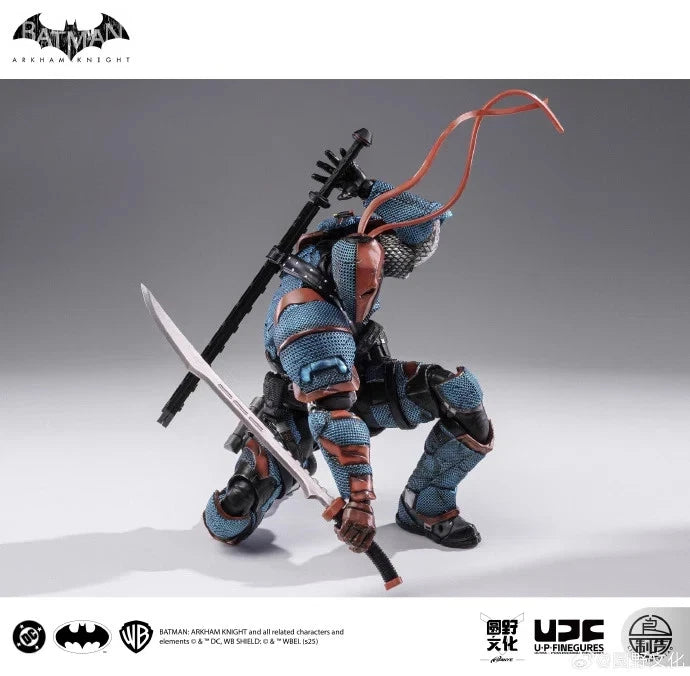 Action figure of a character in blue and brown suit with a sword, on a gray background. Batman: Arkham Knight (Soldier Warrior Edition) 1/12 Scale Premium Action Figures by LPZZ