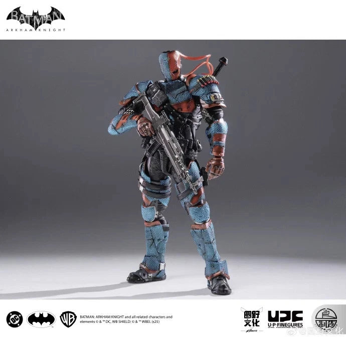 Action figure of a character in tactical gear with a gun, on a gray background with Batman logo. Batman: Arkham Knight (Soldier Warrior Edition) 1/12 Scale Premium Action Figures by LPZZ