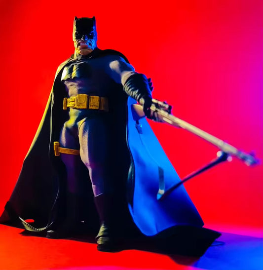 Superhero in a dark costume with a cape against a red and blue gradient background Batman: The Dark Knight Returns "Night Ranger" Collectible Action Figure by Joy Man Toys (JM004)