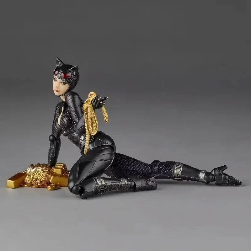 Action figure of a character in a black costume with gold accents on a gray background Catwoman (Selina Kyle) Amazing Yamaguchi 1/12 Scale Action Figure by Kaiyodo
