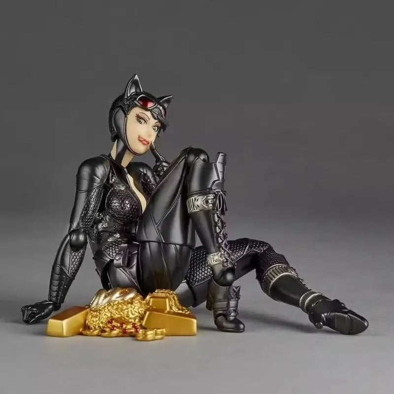 Action figure of a character in black costume with gold objects on a gray background Catwoman (Selina Kyle) Amazing Yamaguchi 1/12 Scale Action Figure by Kaiyodo
