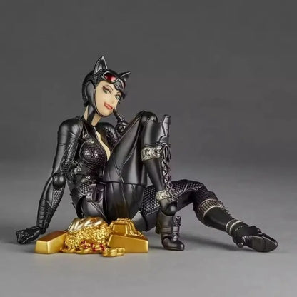 Action figure of a character in black costume with gold objects on a gray background Catwoman (Selina Kyle) Amazing Yamaguchi 1/12 Scale Action Figure by Kaiyodo