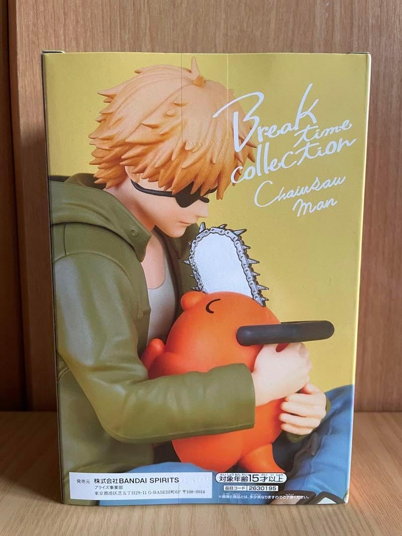 Boxed figurine of a character holding a chainsaw, with 'Break Time Collection' branding. Chainsaw Man Denji & Pochita Authentic Break Time Collection Vol.1 Fixed-Pose Relaxing Statue by Bandai Banpresto box
