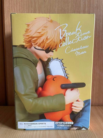 Boxed figurine of a character holding a chainsaw, with 'Break Time Collection' branding. Chainsaw Man Denji & Pochita Authentic Break Time Collection Vol.1 Fixed-Pose Relaxing Statue by Bandai Banpresto box