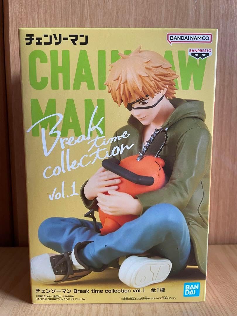 Boxed figure of a character from 'Chain Man' with green background. Chainsaw Man Denji & Pochita Authentic Break Time Collection Vol.1 Fixed-Pose Relaxing Statue by Bandai Banpresto box