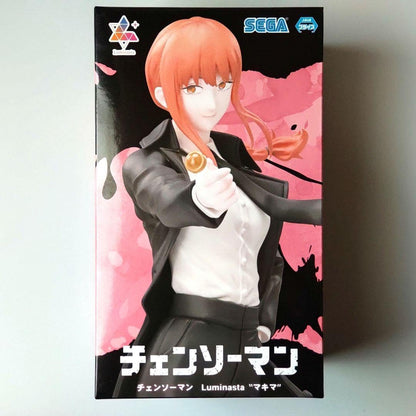 Boxed figure of an animated character with orange hair and a black jacket, featuring Sega branding. Chainsaw Man Makima Authentic 22cm Luminasta Figure – Iconic Lollipop Pose Public Safety Control Devil Statue by SEGA box