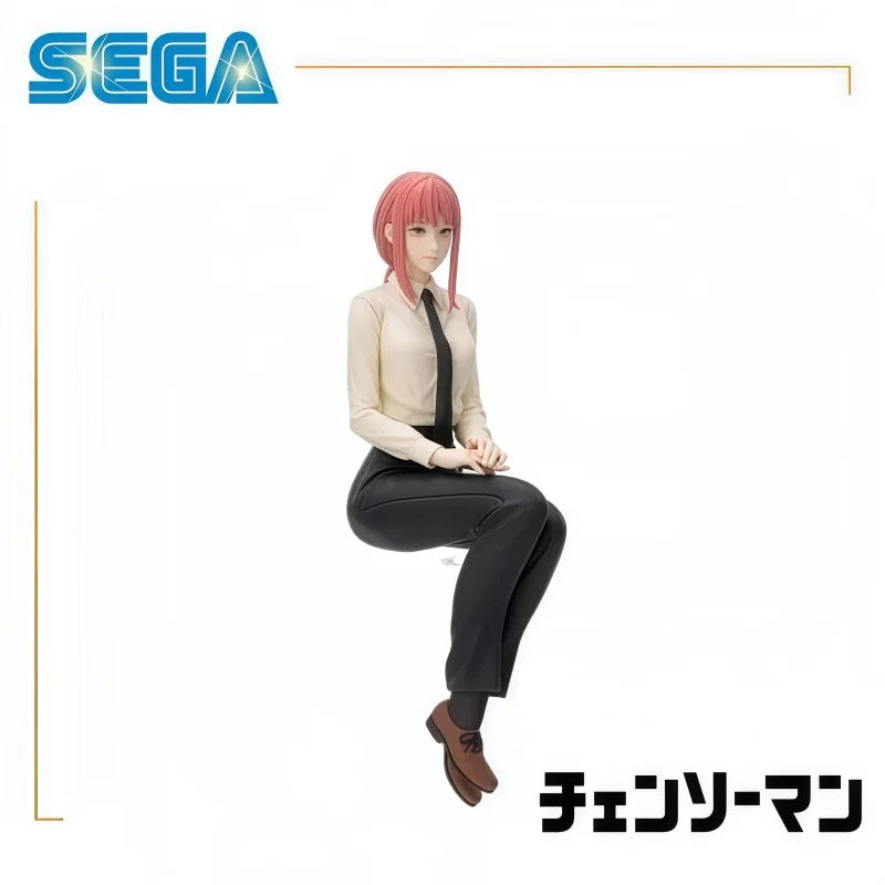 Model figure of a character with pink hair and a business outfit, sitting on a white background with Sega logo. Chainsaw Man Makima Authentic Chokonose Premium Sitting Figure – Public Safety Sofa Pose Character Statue by SEGA