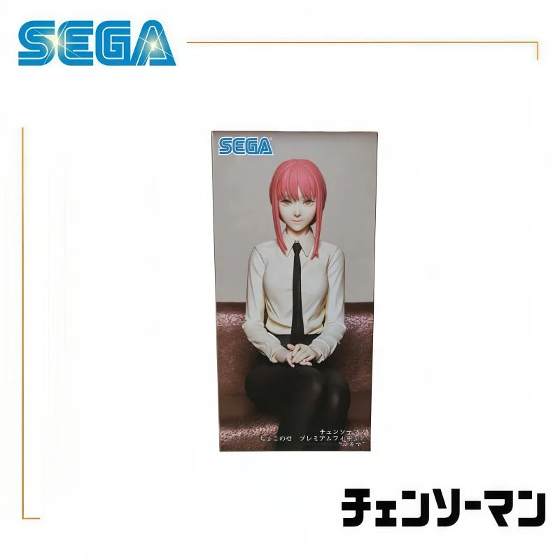 Product packaging with a character and Sega logo on a white background. Chainsaw Man Makima Authentic Chokonose Premium Sitting Figure – Public Safety Sofa Pose Character Statue by SEGA box