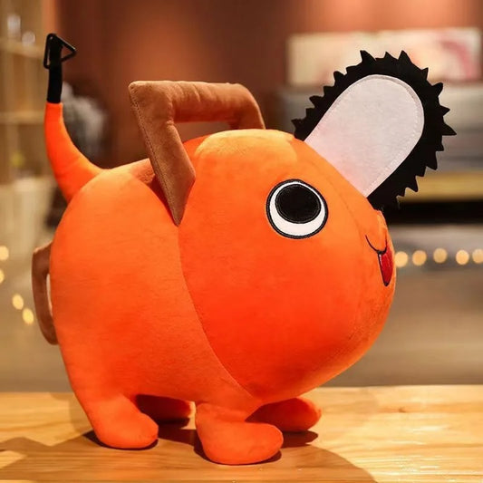 Orange plush toy with a black eye and white blush on a wooden surface. Chainsaw Man Pochita Premium Plush Toy