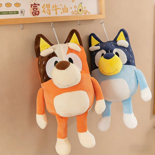 Two cartoon-style wolf plush toys hanging on a hook against a beige wall. Comforting Chilli Heeler Caring Mom – 14-Inch Premium Cotton Plush by Titantoons