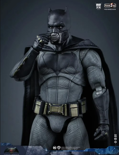 Batman figure holding a camera against a dark background DC Comics Batman (Tactical/Justice League Edition) 1/9 Scale Premium Action Figure by FondJoy