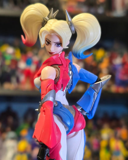 Action figure with colorful outfit and styled hair against a blurred background DC Comics Harley Quinn (Shining Version) 1/12 Scale Precision Assembly Figure by Blokees