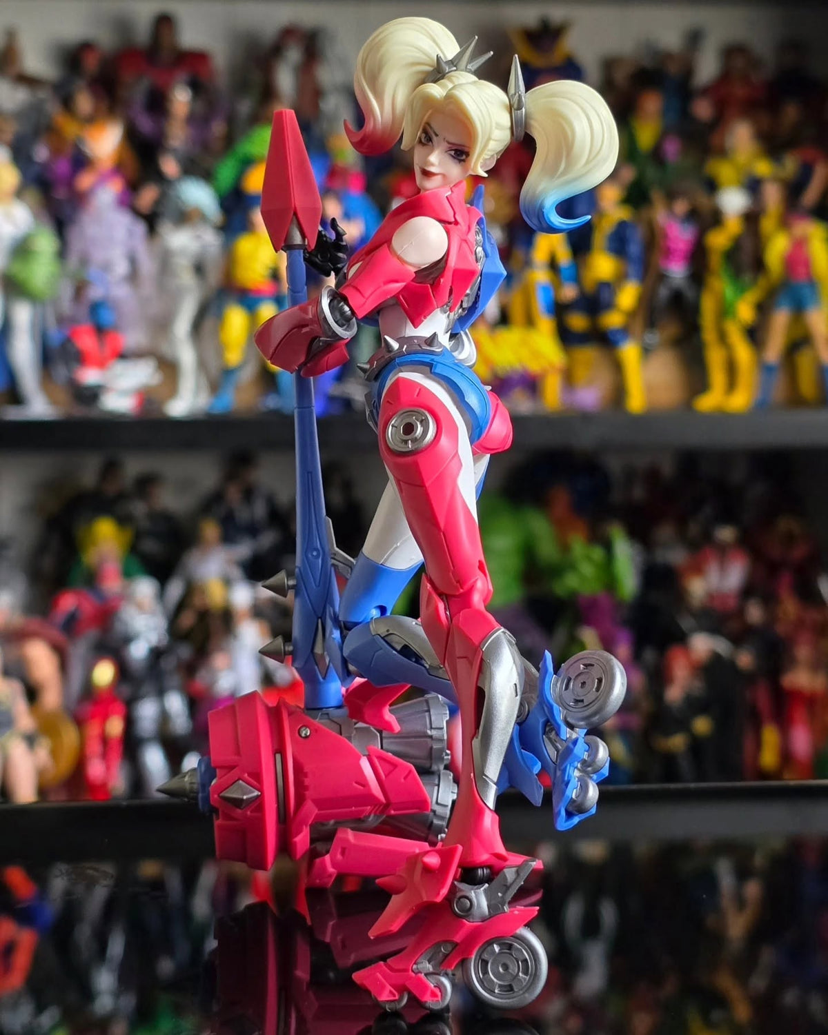 Toy figure of a character with a colorful backgroundcDC Comics Harley Quinn (Shining Version) 1/12 Scale Precision Assembly Figure by Blokees