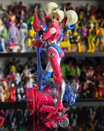 Toy figure of a character with a colorful backgroundcDC Comics Harley Quinn (Shining Version) 1/12 Scale Precision Assembly Figure by Blokees