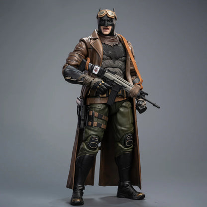 Action figure in a detailed costume with a gun on a gray background DC Comics Knightmare Desert Batman (Batman v Superman Edition) 1/9 Scale Premium Action Figure by FondJoy