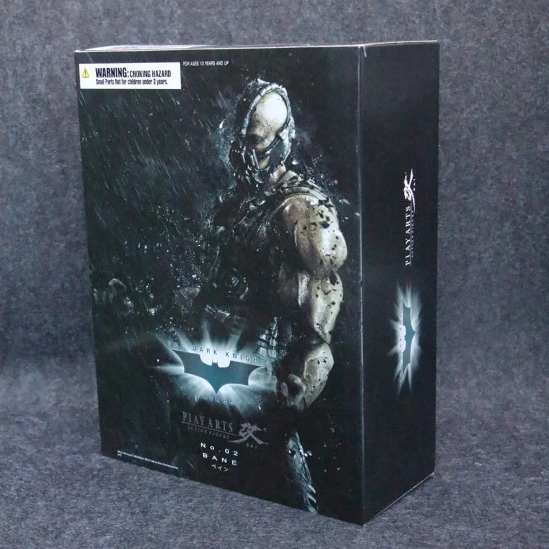Boxed figure of a character with a dark, gritty design on a gray background DC Comics The Dark Knight Rises: Bane Play Arts Kai 26cm Premium Action Figure by Square Enix