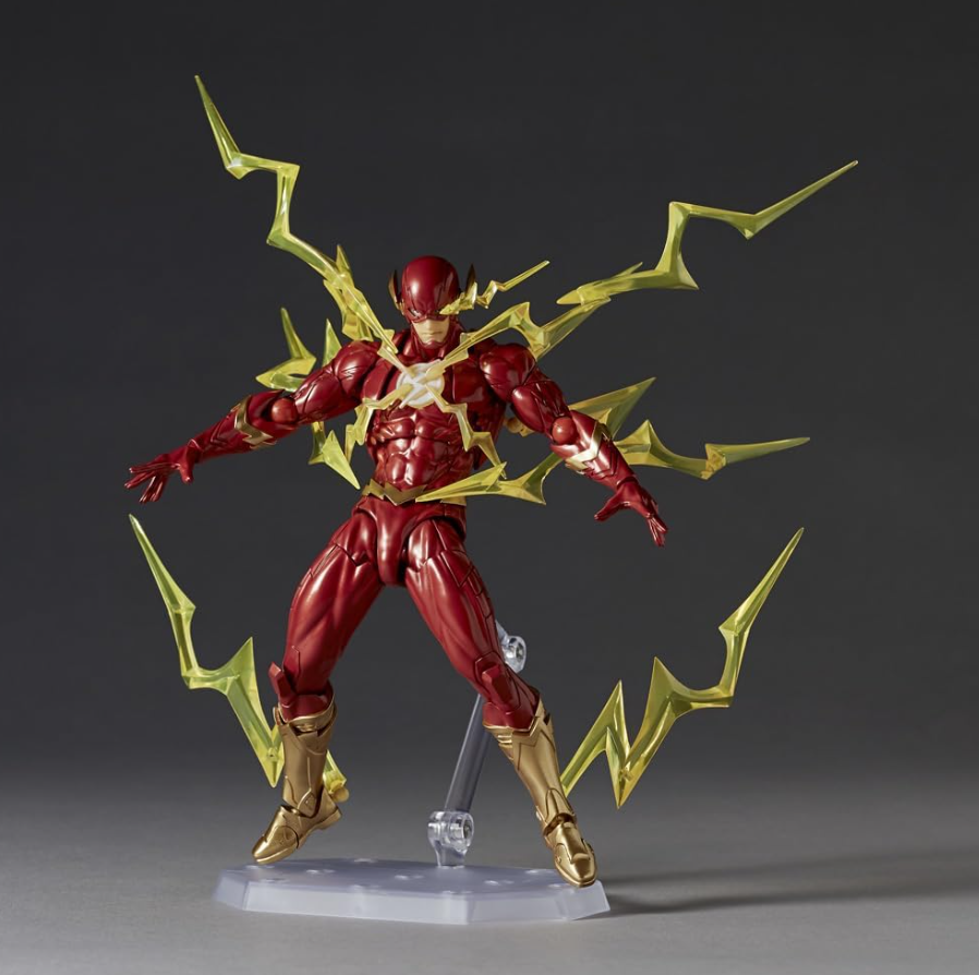 Superhero action figure with red and gold costume on a dark background DC Heroes The Flash (Amazing Yamaguchi No.042) Revoltech Action Figure by Kaiyodo.