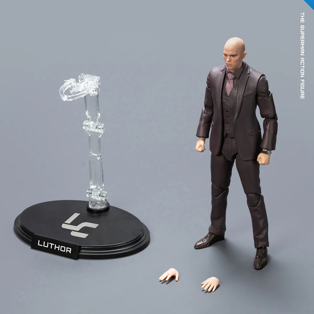 Action figure of a character in a suit with a stand on a gray background DC Studios Lex Luthor (The Mastermind Edition) 1/9 Scale Premium Action Figure by FondJoy