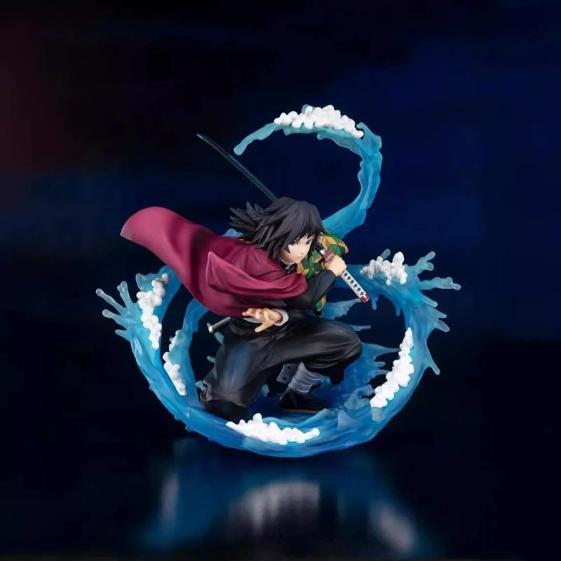 Figurine of a character with a red cloak and sword on a blue wave-like background Demon Slayer: Kimetsu no Yaiba Giyu Tomioka Authentic 17cm PVC Figure – Water Breathing Eleventh Form Dead Calm Special Edition