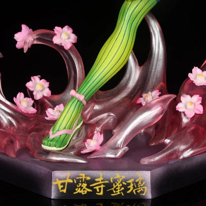 Decorative figurine with green stem, pink flowers, and metallic elements on a dark background Demon Slayer: Kimetsu no Yaiba Mitsuri Kanroji Authentic GK Style Premium Statue Figurine – Love Hashira Love Breathing Edition