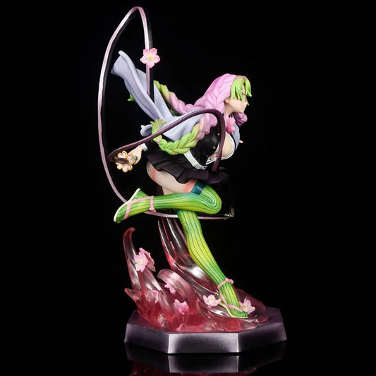 Colorful figurine of a character with pink hair and green outfit on a black background Demon Slayer: Kimetsu no Yaiba Mitsuri Kanroji Authentic GK Style Premium Statue Figurine – Love Hashira Love Breathing Edition side