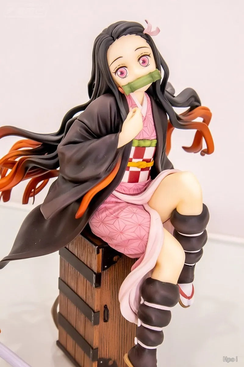 Anime character figurine with tied mouth sitting on a barrel Demon Slayer: Kimetsu no Yaiba Nezuko Kamado Authentic 15cm Sitting PVC Figure – Box Perch Display Edition
