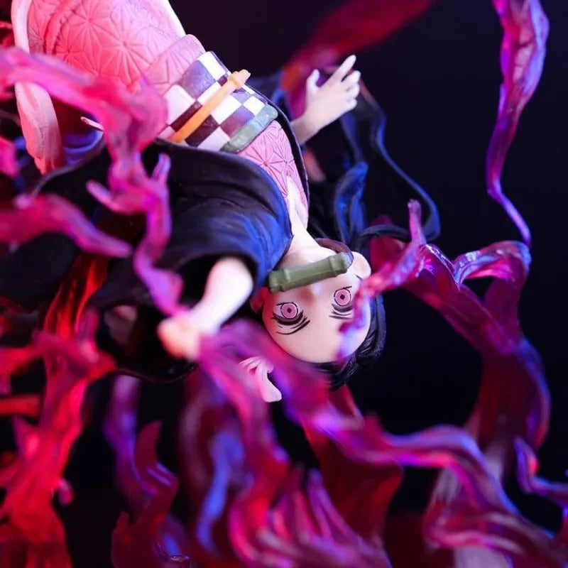 Anime character with pink hair and colorful outfit surrounded by pink energy on a dark background Demon Slayer: Kimetsu no Yaiba Nezuko Kamado Authentic 16cm PVC Figure – Blood Demon Art Exploding Blood Special Edition