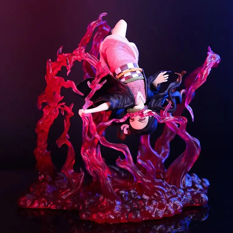 Figurine of a character with red energy effects on a dark background Demon Slayer: Kimetsu no Yaiba Nezuko Kamado Authentic 16cm PVC Figure – Blood Demon Art Exploding Blood Special Edition