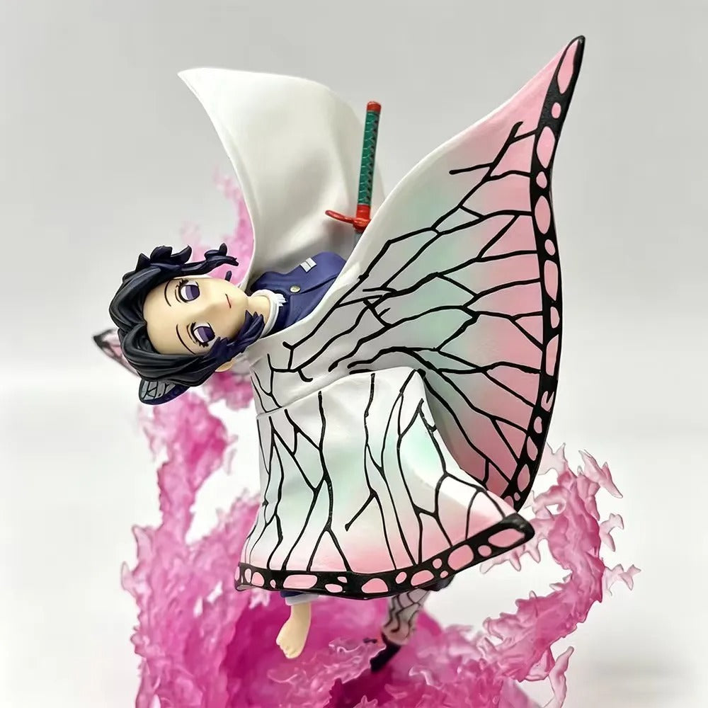 Anime character figurine with butterfly wings on a pink and white background Demon Slayer: Kimetsu no Yaiba Shinobu Kocho Authentic GK Style Premium PVC Figure – Insect Breathing Butterfly Dance Edition