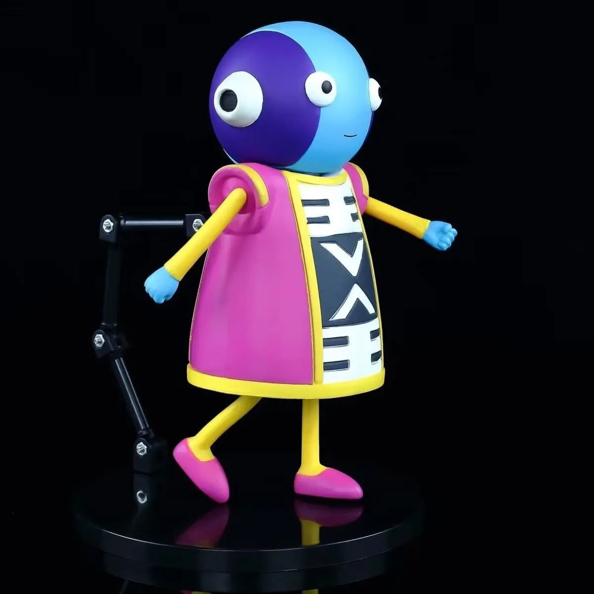 Colorful cartoon-like figure with a purple and blue head, pink outfit, and yellow arms and legs on a black background. Dragon Ball Super: Grand Zeno (Zen-Oh) 14cm Premium Vinyl Figure
