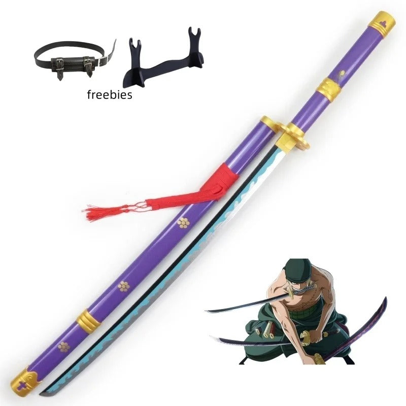 Sword with purple blade and gold accents, accompanied by a small figure of a character in green clothing. One Piece: Roronoa Zoro 41-Inch Authentic Replica Bamboo Katana