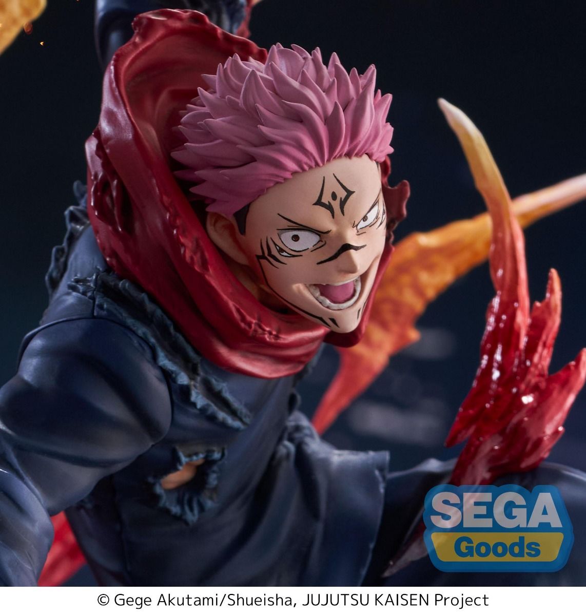Action figure with pink hair and red hood, featuring the Sega Goods logo. JUJUTSU KAISEN Ryomen Sukuna Authentic SEGA FIGURIZM Prize Figure – Encounter Version King of Curses Throne of Skulls Statue closeup