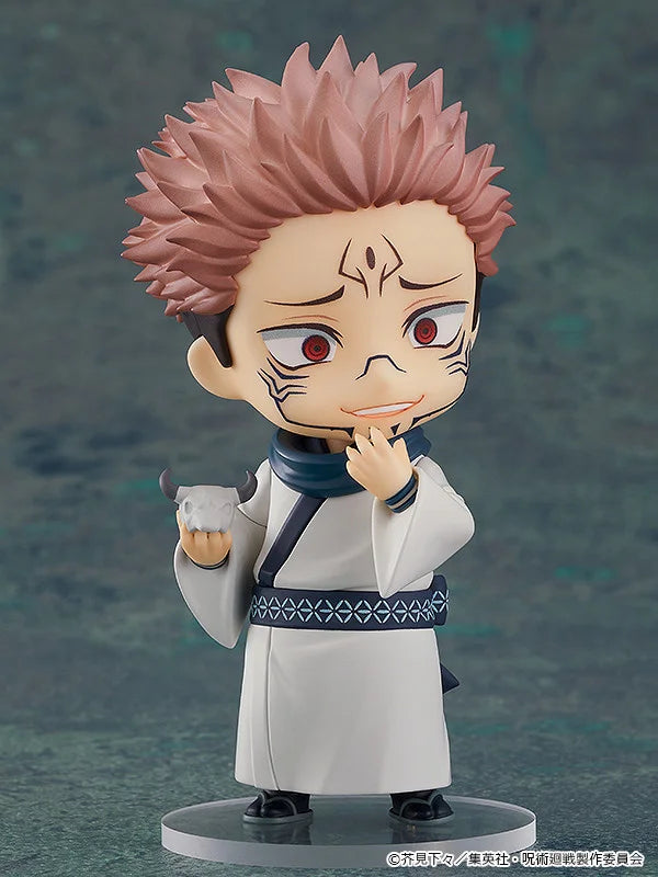 Action figure of a character with spiky pink hair and white outfit on a dark background Jujutsu Kaisen 0 Nendoroid No. 1834 Satoru Gojo Authentic 10cm Chibi Action Figure – Movie Prequel White Bandage Edition cute