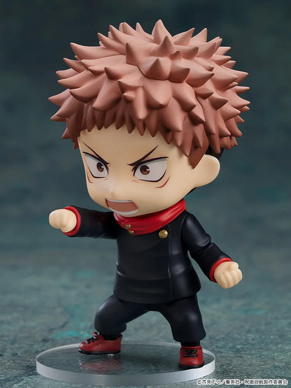 Action figure with spiky hair and black outfit on a gray background Jujutsu Kaisen Nendoroid No. 1479 Megumi Fushiguro Authentic 10cm Chibi Action Figure – Ten Shadows Technique Edition fist