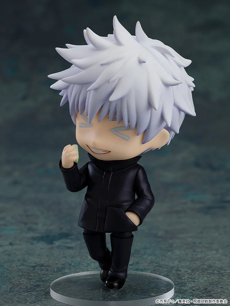 Action figure with white hair and black outfit on a dark background Jujutsu Kaisen Nendoroid No. 1528 Satoru Gojo Authentic 10cm Chibi Action Figure – Modern World's Strongest Sorcerer Edition smile