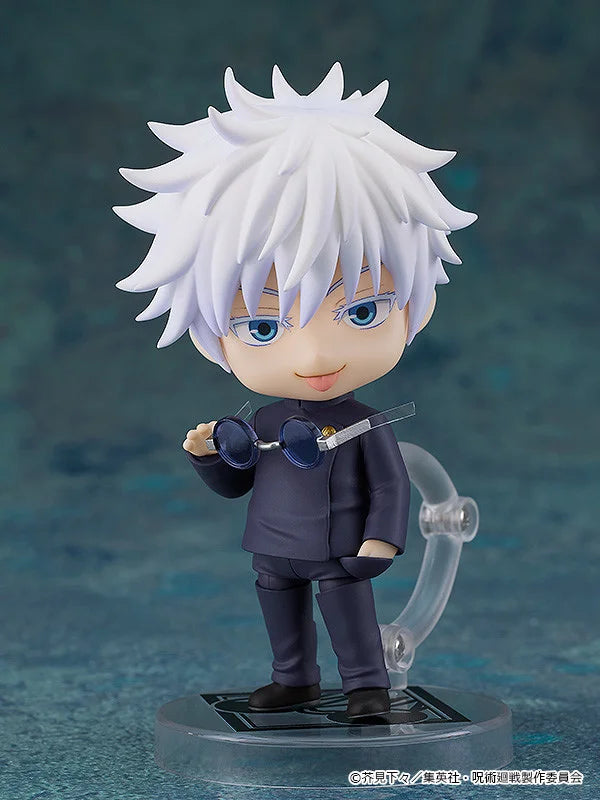 Figurine of a character with white hair and blue eyes, holding sunglasses, on a dark background. Jujutsu Kaisen Nendoroid No. 2205 Satoru Gojo Authentic 10cm Chibi Action Figure glasses