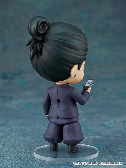 Figurine of a character with dark hair and purple outfit holding a smartphone on a blue textured background Jujutsu Kaisen Nendoroid No. 2206 Suguru Geto Authentic 10cm Chibi Action Figure back