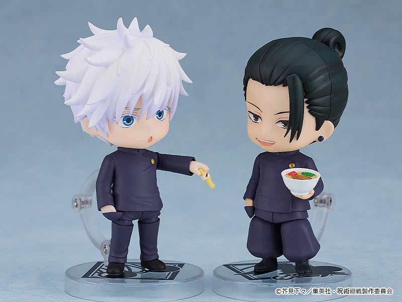 Two figurines in dark uniforms, one with white spiky hair and the other with black hair, on a gray background. Jujutsu Kaisen Nendoroid No. 2206 Suguru Geto Authentic 10cm Chibi Action Figure scene
