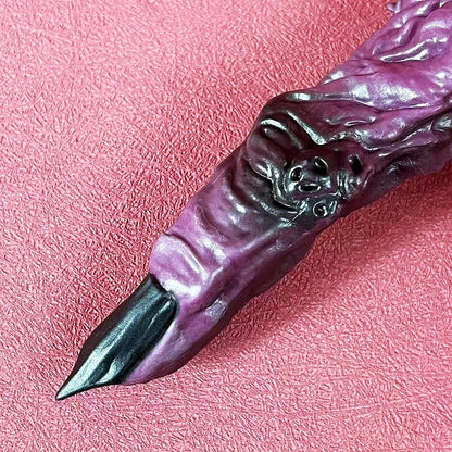 Purple and silver fantasy weapon handle on a pink textured background Jujutsu Kaisen Ryomen Sukuna Cursed Finger Authentic Figurine Prop Replica Set – Special Grade Cursed Object Edition with Talisman-Sealed Wooden Storage Box