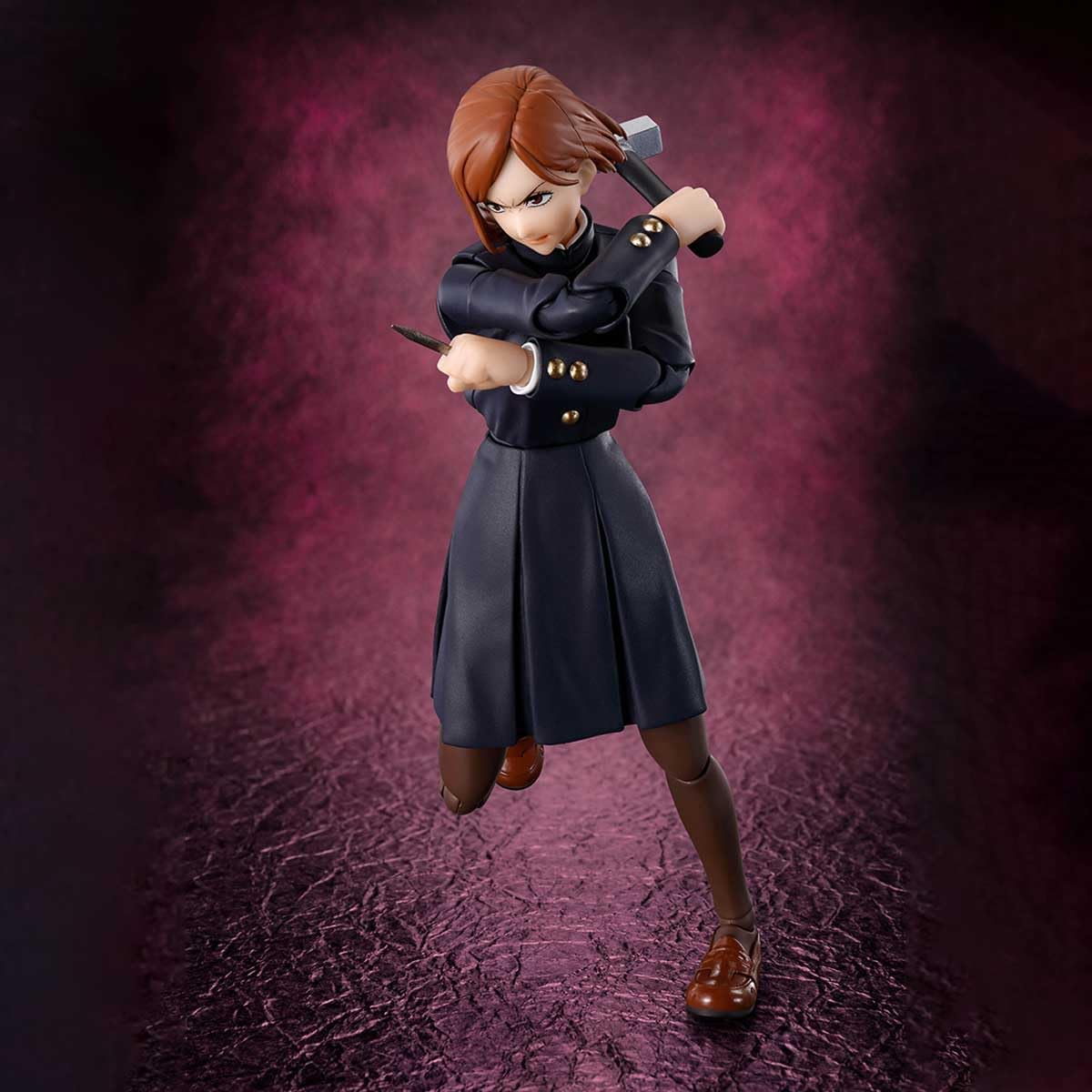 Action figure in a black outfit with a weapon on a textured purple background Jujutsu Kaisen S.H.Figuarts Nobara Kugisaki Authentic 13.5cm Articulated Action Figure – Straw Doll Technique Edition fight pose