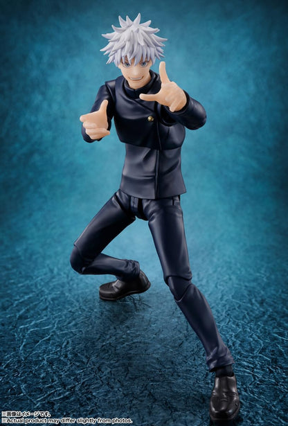 Action figure with white hair and black outfit on a blue textured background Jujutsu Kaisen S.H.Figuarts Satoru Gojo Authentic 16cm Articulated Action Figure – Tokyo Jujutsu High School Edition