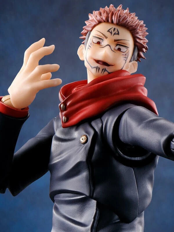 Action figure with red scarf and black jacket against a blue background Jujutsu Kaisen S.H.Figuarts Yuji Itadori Authentic 15cm Articulated Action Figure – Original Standard First Edition face