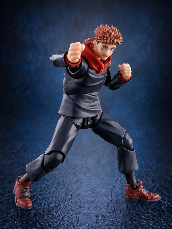 Action figure in dynamic pose against a dark blue background Jujutsu Kaisen S.H.Figuarts Yuji Itadori Authentic 15cm Articulated Action Figure – Original Standard First Edition fight
