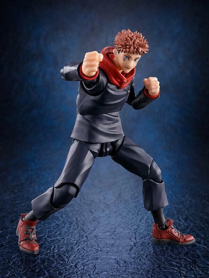 Action figure in dynamic pose against a dark blue background Jujutsu Kaisen S.H.Figuarts Yuji Itadori Authentic 15cm Articulated Action Figure – Original Standard First Edition fight