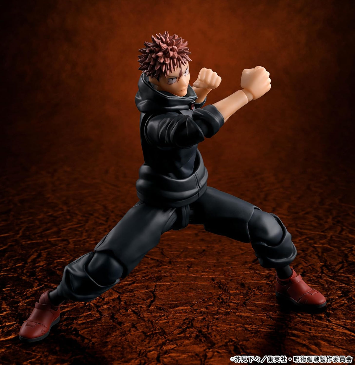 Action figure in dynamic pose on a brown textured background Jujutsu Kaisen S.H.Figuarts Yuji Itadori Authentic 15cm Articulated Action Figure – Sukuna Vessel Edition