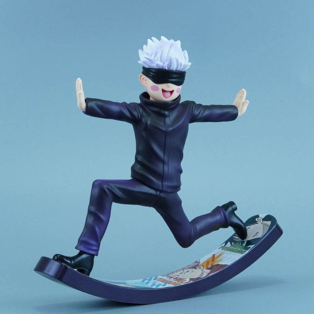 Action figure of a character in a dynamic pose on a blue background Jujutsu Kaisen Satoru Gojo Authentic 6.6-Inch Playful Swing PVC Figure – Kinetic Rocking Base & Joyful Blindfold Edition