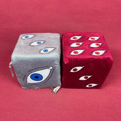Two dice-shaped pouches with eye designs on a red background Jujutsu Kaisen Satoru Gojo Prison Realm Authentic Plush Sponge Cube Figures – 2-Piece Activated State Set